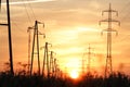 Electricity towers at sunset Royalty Free Stock Photo