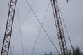 Electricity transmission power lines on winter background High voltage tower. Royalty Free Stock Photo