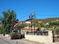 Electricity Workers Relocating a Power Pole, Greece