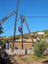 Electricity Workers Relocating a Power Pole, Greece