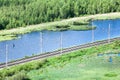 Electrified railroad in northern woods