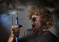 Electrocuted man with cable smoking after domestic accident with dirty burnt face shock electrocuted expression