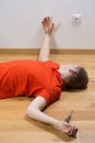 Electrocuted man lying on the floor