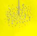 Electrode with crumbs of metal on yellow background. Creative welding concept. Royalty Free Stock Photo