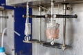 Electrolysis of copper sulfate in lab. It takes place in an electrolytic cell where electrolysis