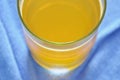 Electrolyte orange flavor powder dissolution in freshwater Royalty Free Stock Photo