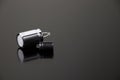 Electrolytic capacitor isolated on a black background. Copy space. Electronic components. Royalty Free Stock Photo