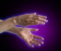 Electromagnetic Aura around healer's hands Royalty Free Stock Photo