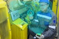 Electromechanic performs repair work on a diesel generator. New technology for equipment quality control: The mechanic - the