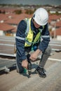 Electromechanical solar panel technician install, assemble photovoltaic systems on roof based on site assessment and schematic