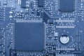 Electronic board. The board features elements: chips, diodes, capacitors, chokes. Shallow depth of field. Royalty Free Stock Photo