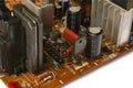 Electronic board with radio components, connectors, slots and processor chip from an electronic device, close-up Royalty Free Stock Photo
