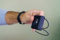 Electronic bracelet for criminals. Gadget for control and monitoring of the execution of punishment