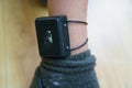 Electronic bracelet for criminals. Gadget for control and monitoring of the execution of punishment