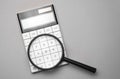 Electronic calculator with magnifier. Business accessories. Business economics, calculator, desktop