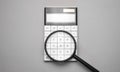 Electronic calculator with magnifier. Business accessories. Business economics, calculator, desktop
