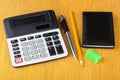 Electronic calculator, notepad, pen, sharpener and pencil Royalty Free Stock Photo