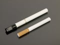 Electronic Cigarette with analog cigarette Royalty Free Stock Photo