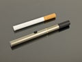 Electronic Cigarette with analog cigarette Royalty Free Stock Photo