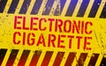Electronic cigarette lettering on danger sign with yellow and black stripes. Electronic e-cigarette warning sign.