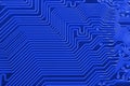 Electronic circuit board as an abstract background pattern. Macro close-up toned Royalty Free Stock Photo