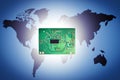 Electronic circuit board on world map background.
