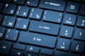 Electronic collection - laptop keyboard. The focus on the Enter key. Toning is blue Royalty Free Stock Photo