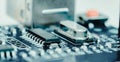 Electronic components, chips and capacitors on the blue pcb, close up view. Technology concept Royalty Free Stock Photo
