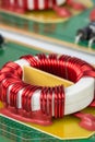 Electronic components electromagnetic coil inductor on circuit board Royalty Free Stock Photo