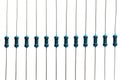 Electronic components: resistors on paper tape isolated on white - Image Royalty Free Stock Photo