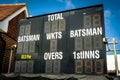 Electronic cricket scoreboard showing run chase in second innings