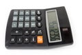Electronic desk calculator on white background, side view close-up Royalty Free Stock Photo