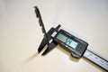 Electronic digital vernier caliper details and close-up. The appearance of an electronic digital vernier caliper