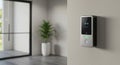 Electronic door access control system mounted on a wall, featuring a sleek Royalty Free Stock Photo