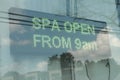 electronic electric digital rectangle horizontal sign that says spa open from 9. ph Royalty Free Stock Photo