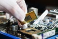 Electronic engineer of computer technology. Maintenance computer cpu hardware upgrade of motherboard component. Pc repair, technic Royalty Free Stock Photo