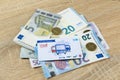 electronic eTicket on table among euro, monthly travel passes in germany for public transport, travel concept for country,