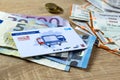 electronic eTicket on table among euro, monthly travel passes in germany for public transport, travel concept for country,