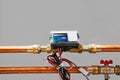 Electronic heat meter on copper pipes with valve
