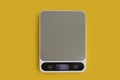 Electronic kitchen scales on a colored background Royalty Free Stock Photo