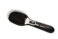 Electronic massage black comb. Royalty Free Stock Photo