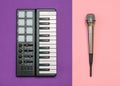 Electronic music mixer and radio microphone on two-tone background. Equipment for the music Studio. The view from the top. Royalty Free Stock Photo
