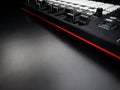 Electronic musical instrument or audio mixer or sound equalizer on a black background analog modular synthesizer Royalty Free Stock Photo