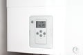 Electronic panel of a white electric water heater. Royalty Free Stock Photo