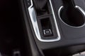 Electronic parking brake EPB button in a modern car Royalty Free Stock Photo