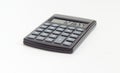 Electronic pocket calculator on a white background at selective Royalty Free Stock Photo