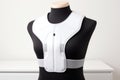 electronic posture corrector on a white table