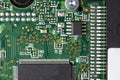 Electronic printed circuit board with digital microcircuits top view, microprocessors and microcontrollers Royalty Free Stock Photo