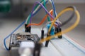 Electronic programming background. Microcontroller project. Arduino electronic platform for hobbyists concept Royalty Free Stock Photo