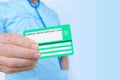 electronic public health insurance cheaper, Insurance Card EU in male doctor's hand